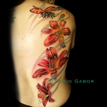 Tattoos - Realistic color feminine tattoo of lillies and flying ladybug - 112099